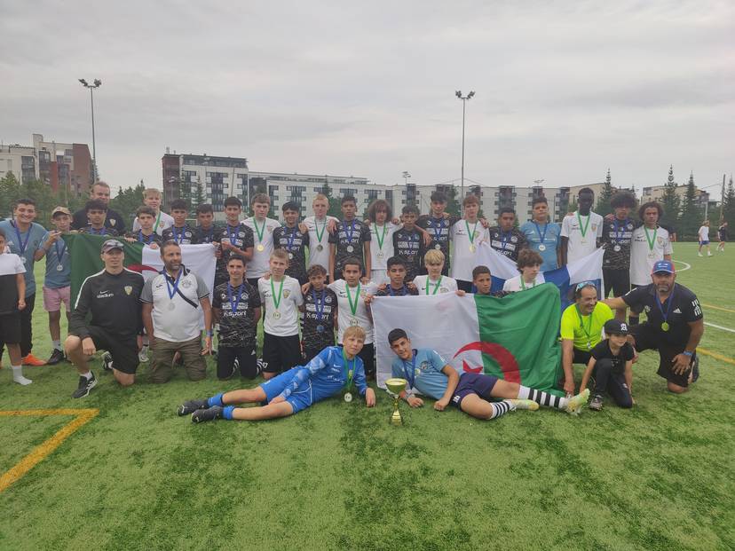 A friendly football game between an Algerian and Finnish teams under 15